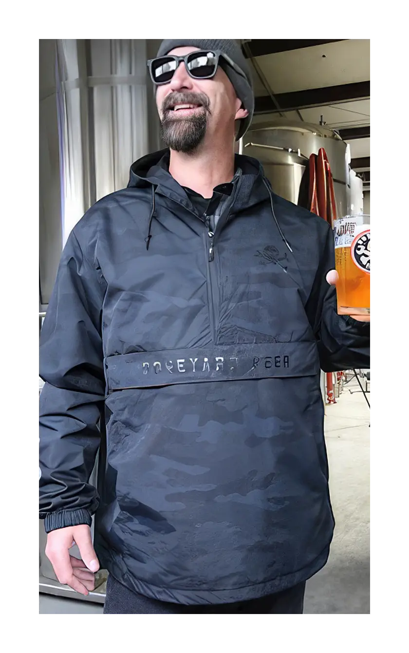 Boneyard beer black camo jacket being worn within the brew house.