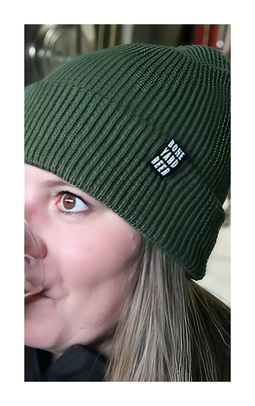 A photograph of the green waffle knit beanie.