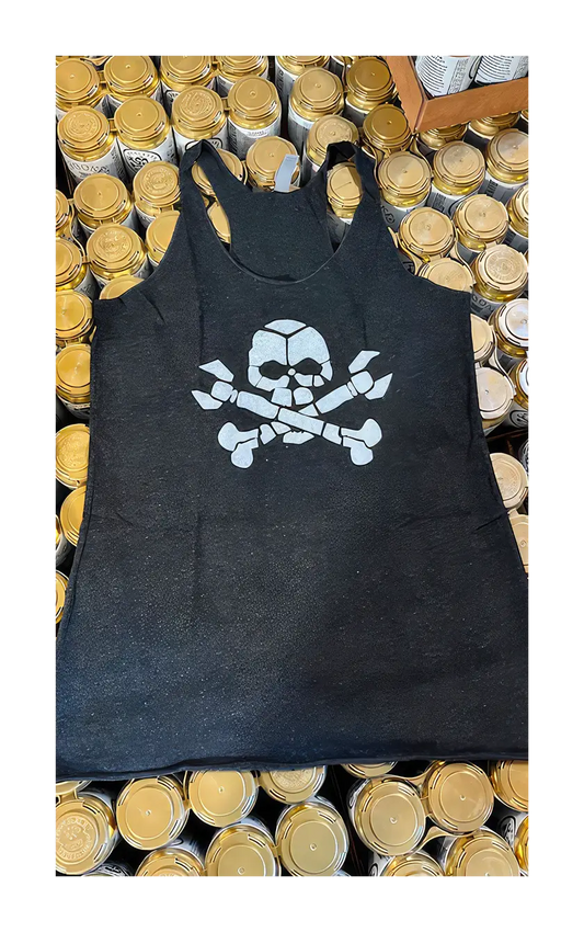 A photograph of the black skull tank on a pallet of beer.