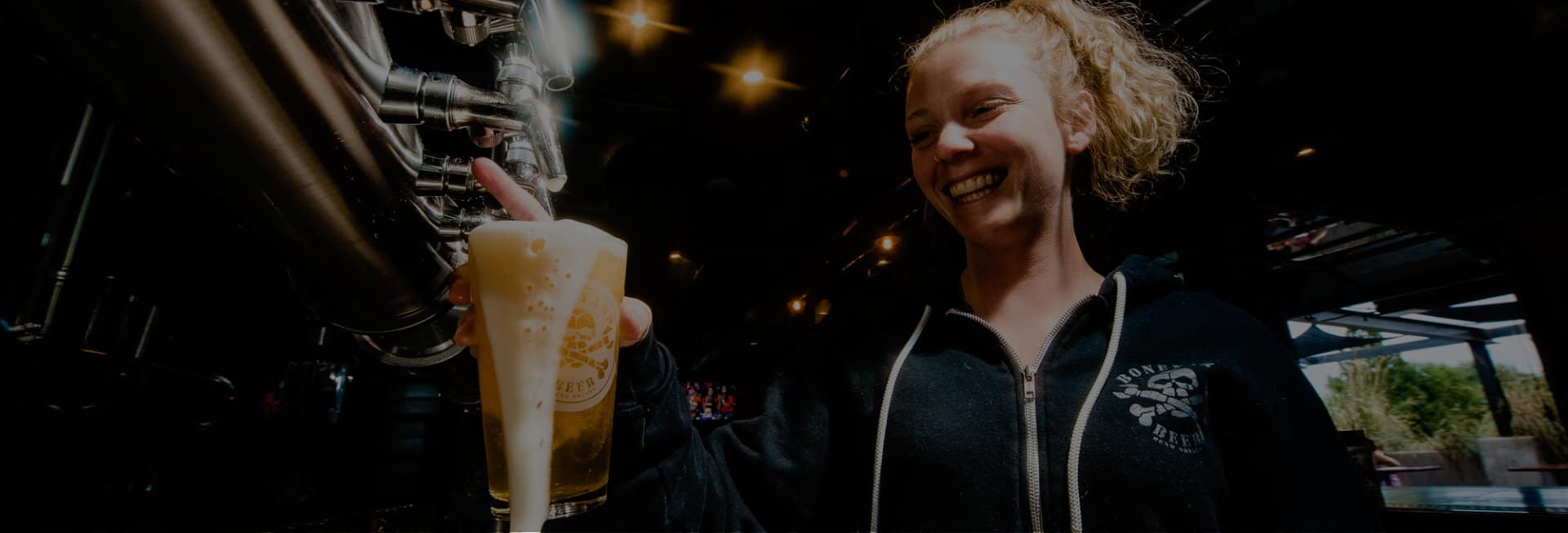 A photo of a beer being poured in the Boneyard Pub.