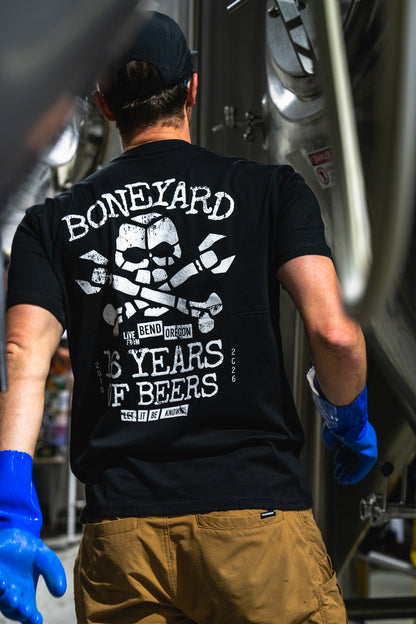 back of man wearing Boneyard 16 years of beers shirt
