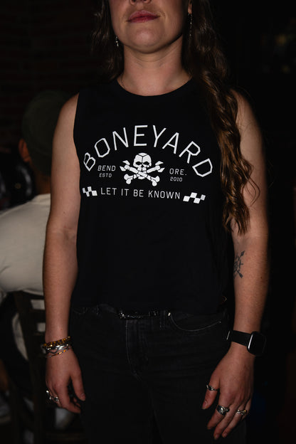 Person wearing a black tank top with 'Boneyard' logo and text.